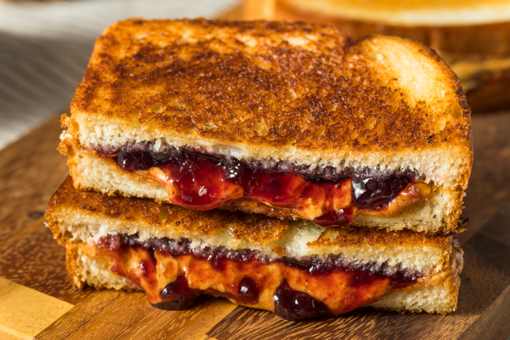 Blueberry grilled cheese sandwich with melted cheese and fresh blueberries