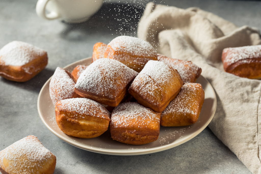 anilla French Beignets dusted with powdered sugar